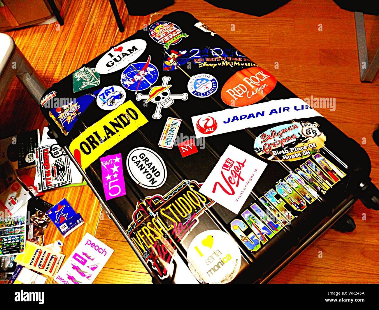 Suitcase With Travel Stickers High Resolution Stock Photography and