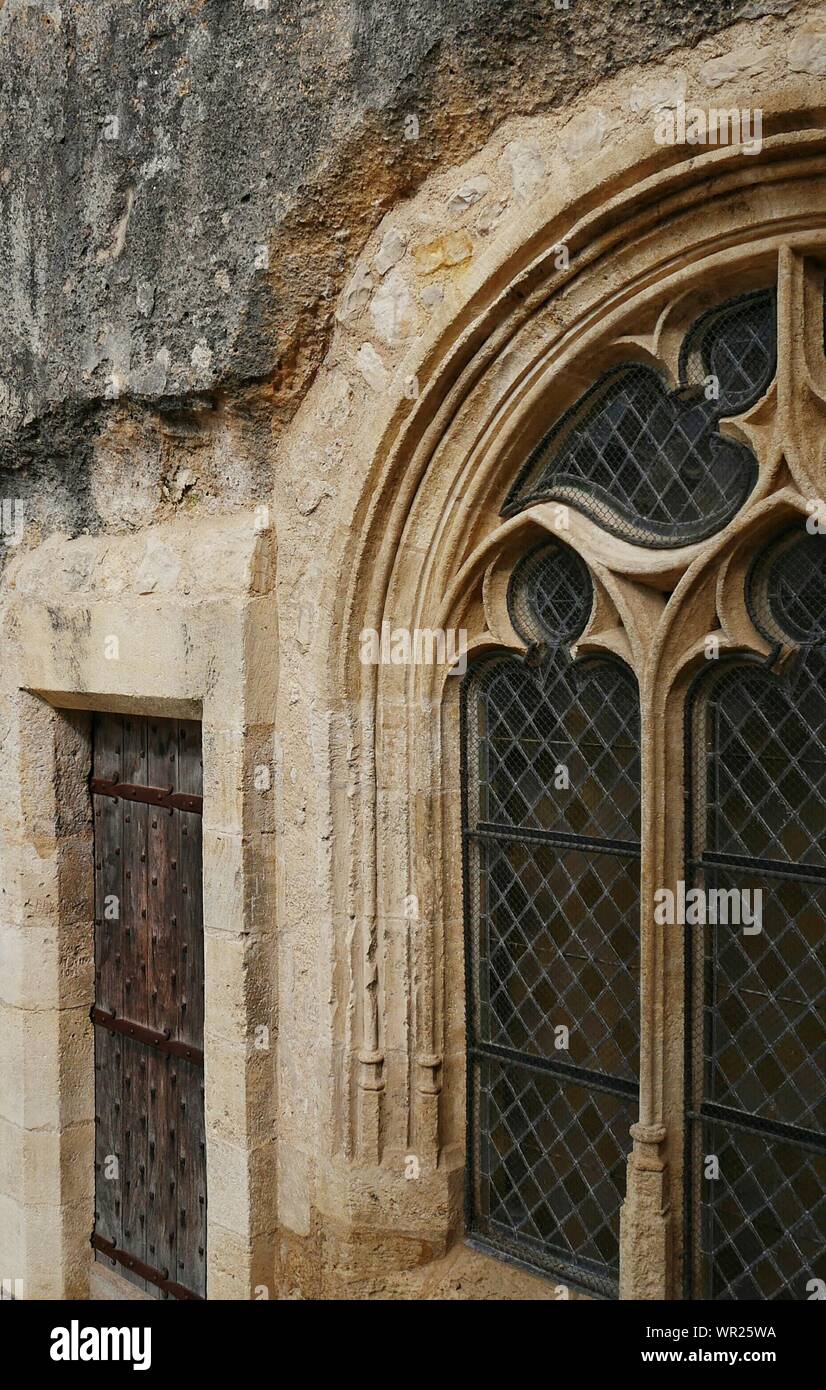 Window Of Historic Monolithic Church At Aquitaine Stock Photo