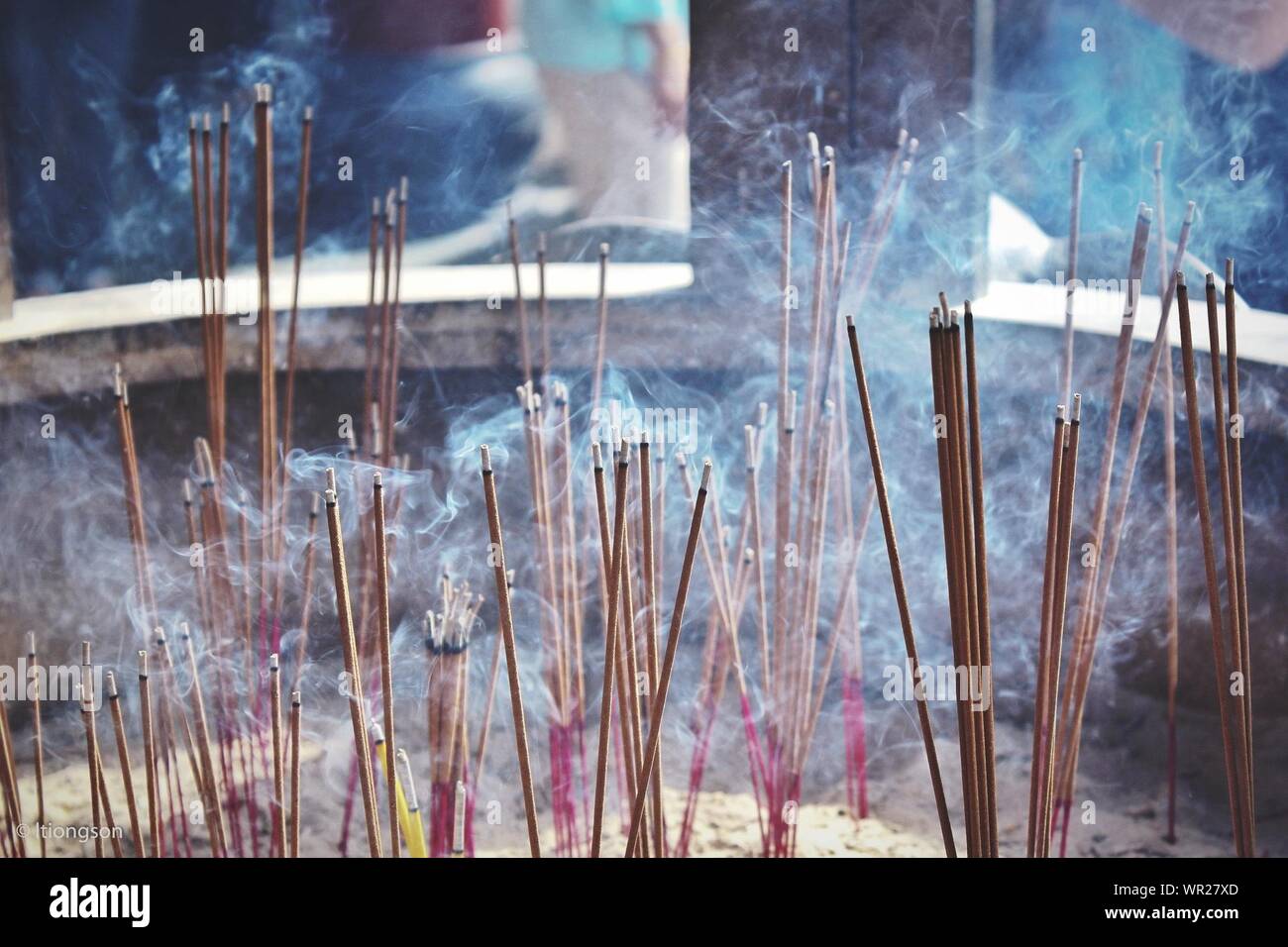 Joss Sticks In An Incense Pot Stock Photo Alamy