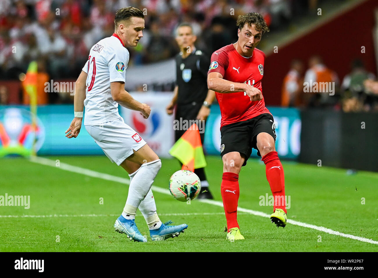 Warsaw, Poland. 09th Sep, 2019. Piotr Zielinski from Poland (L) and Julian Baumgartlinger from Austria (R) are seen in action during the Euro 2020 Qualifiers (Group G) match between Poland and Austria.(Final score; Poland 0:0 Austria) Credit: SOPA Images Limited/Alamy Live News Stock Photo