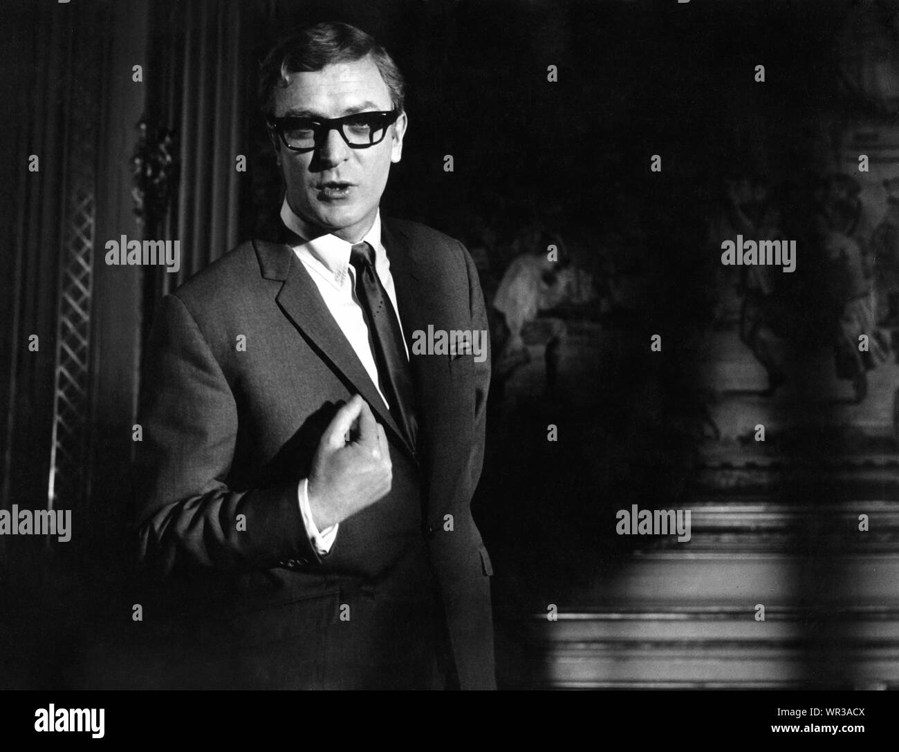 MICHAEL CAINE as Harry Palmer in FUNERAL IN BERLIN 1966 director Guy Hamilton novel Len Deighton executive producer Harry Saltzman Jovera Pictures AG/SA  / Lowndes Productions Ltd / Paramount British Pictures Stock Photo