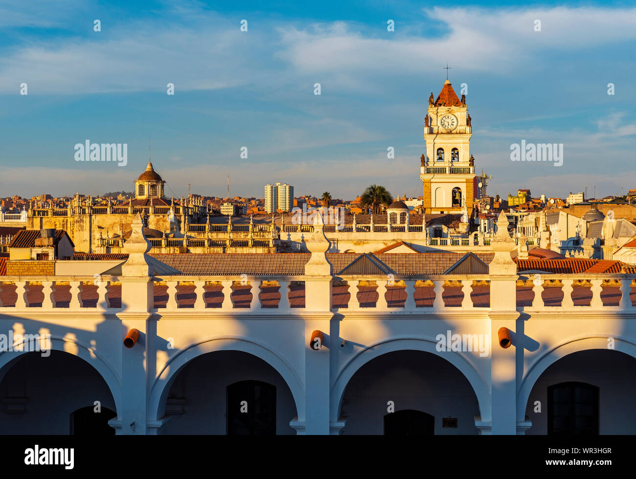 Cityscape of Sucre city at sunset seen from the Felipe Neri Convent with the Cathedral tower, Bolivia. Stock Photo