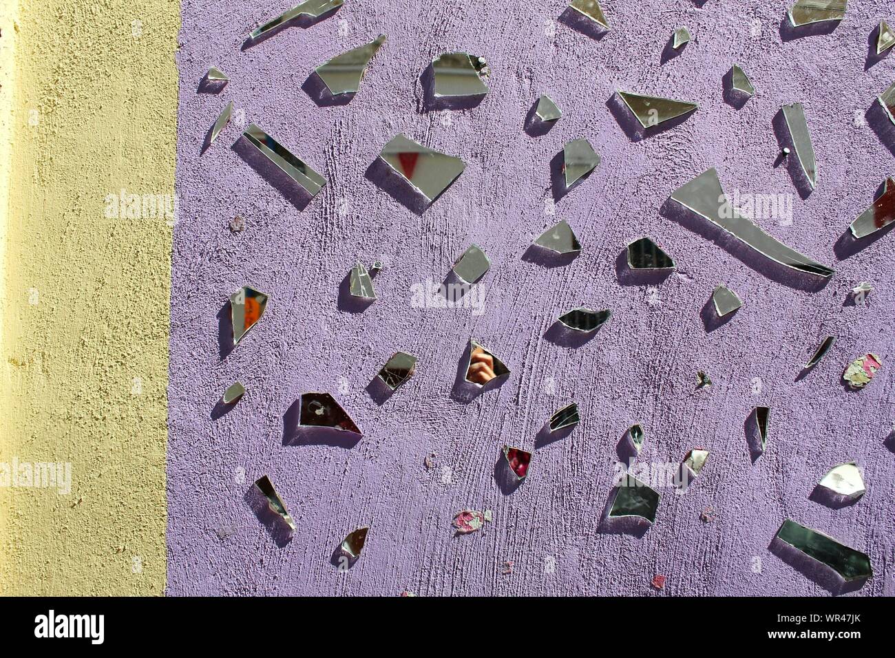 Broken Mirrors On Wall Stock Photo Alamy