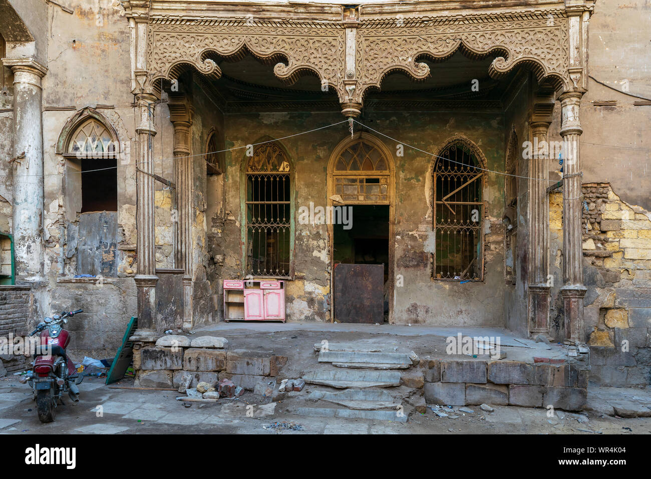 Cairo, Egypt- January 16 2016: Facade of Bayt Madkour Pasha historic abandoned house located at Souq Al Selah Street, Darb Al Ahmar district, Old Cairo Stock Photo