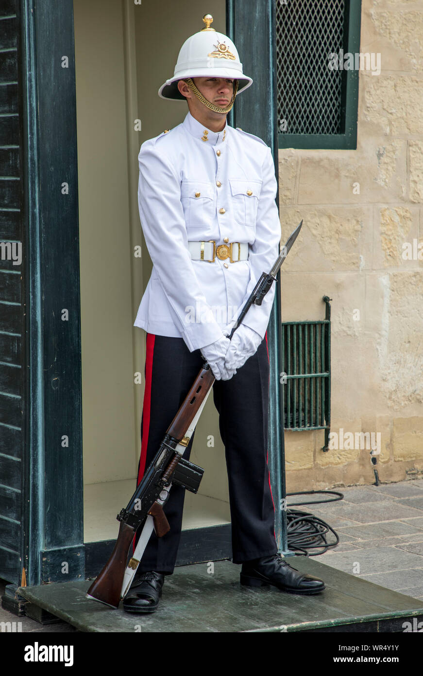 Valetta, Malta, guard at Grandmaster Palace, Neptune Court, courtyard of the palace, Palace Square, government building and museum, Stock Photo