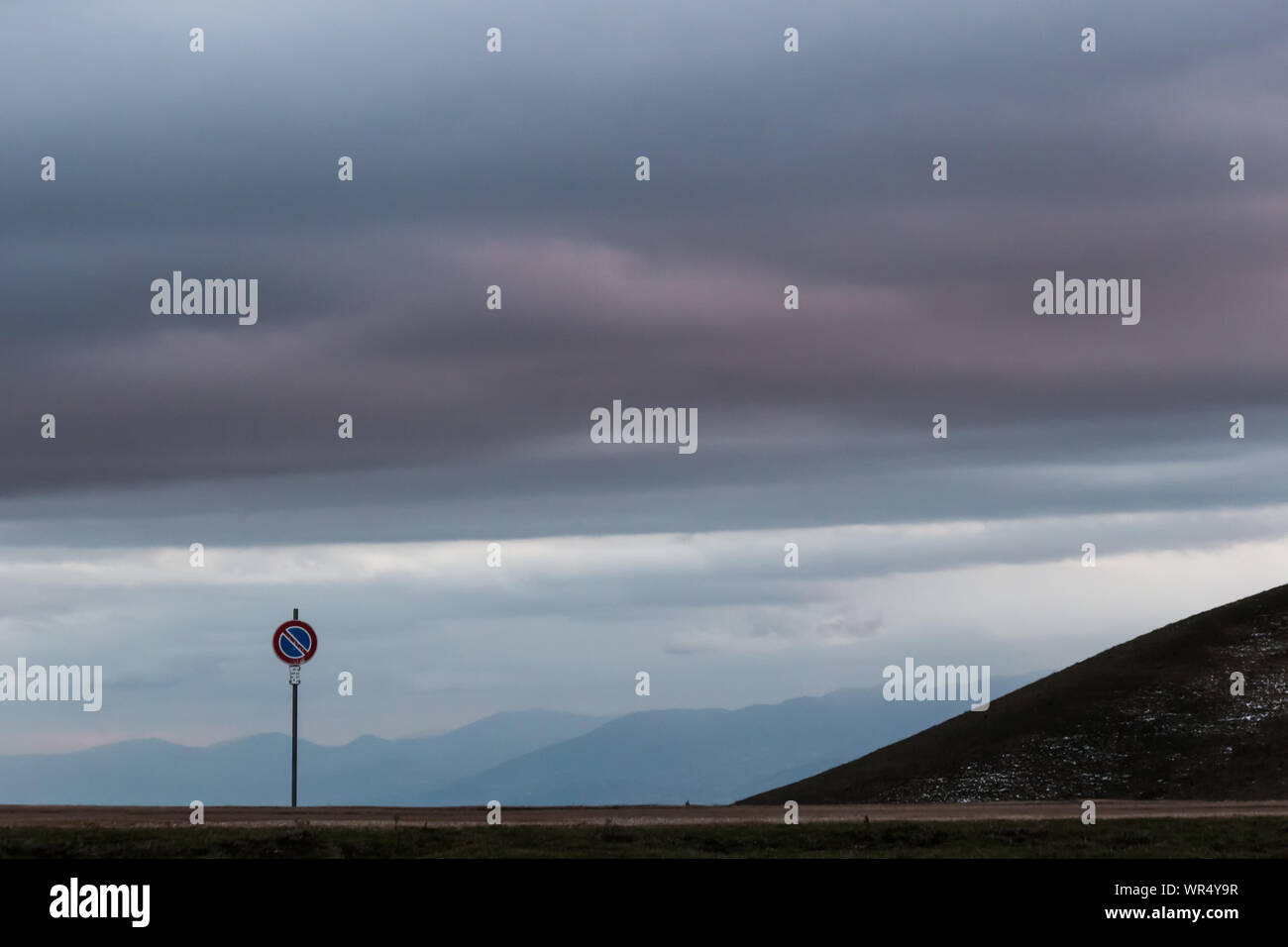 Road sign against a moody sky background with big clouds Stock Photo ...