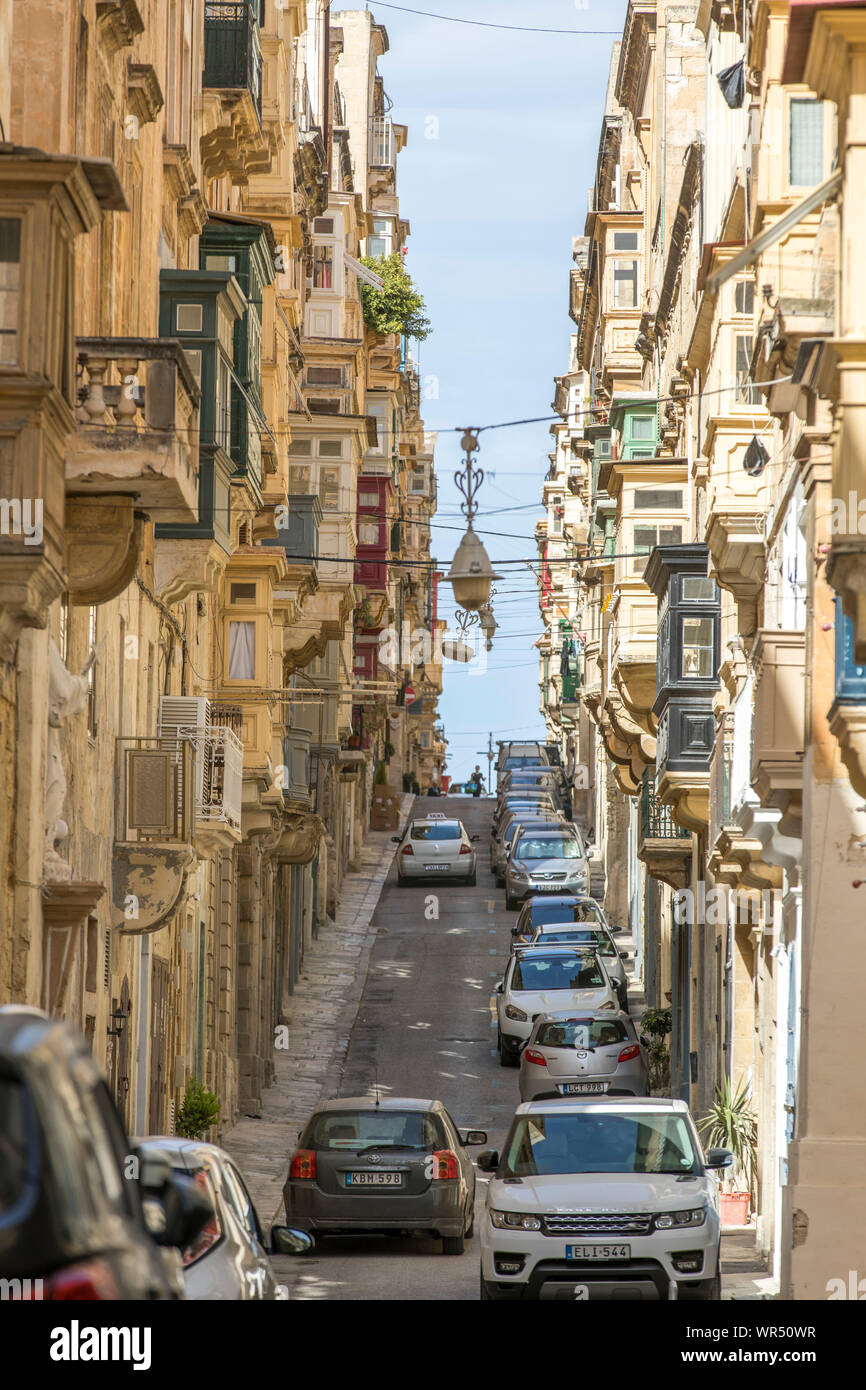 Malta, old town of Valetta, narrow, steep street, alleys, St. Ursula Street, Stock Photo
