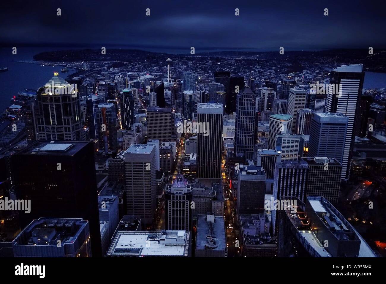 High Angle View Of City Lit Up At Night Stock Photo Alamy