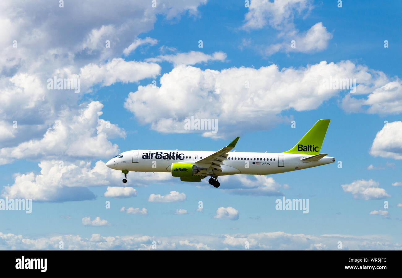 Barcelona, Spain; May 18, 2019: Airbus A220 of the Air Baltic company, landing at El Prat airport in Barcelona Stock Photo