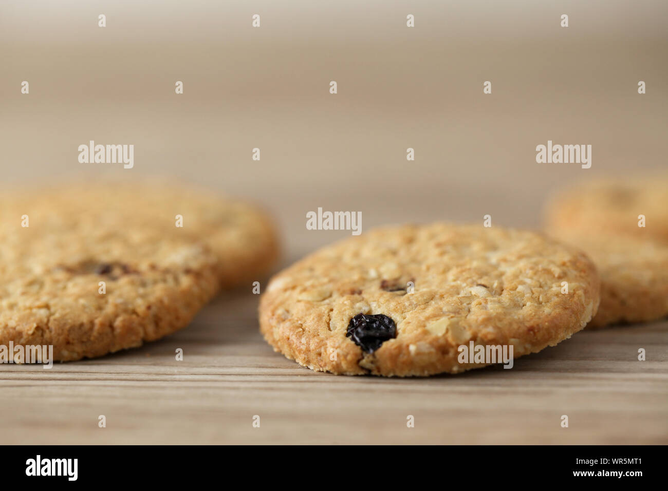 biscuit cookies closeup isolated on wood table Stock Photo