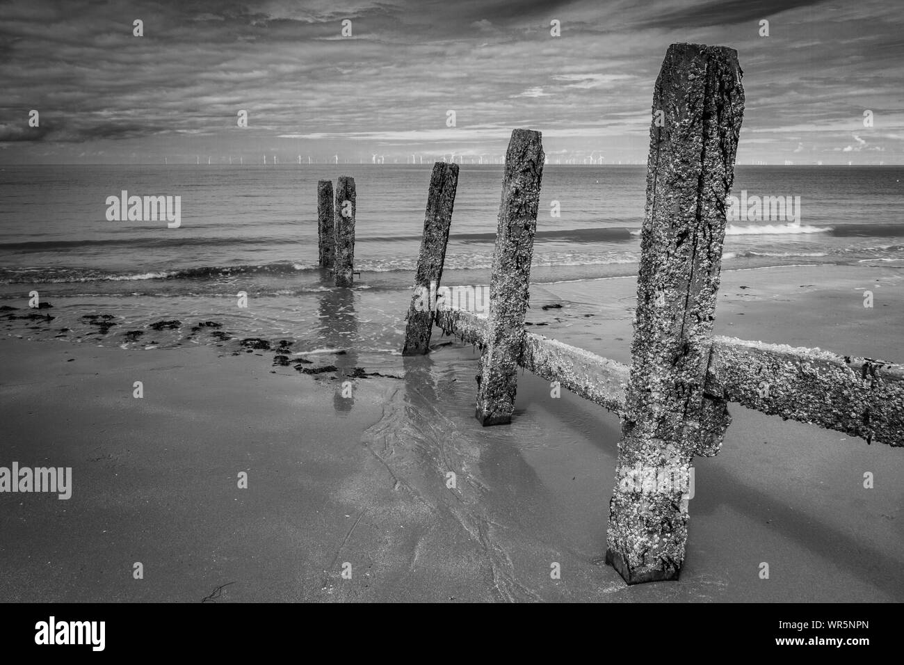 Old beach defences at Llandulas beach, North Wales Stock Photo - Alamy