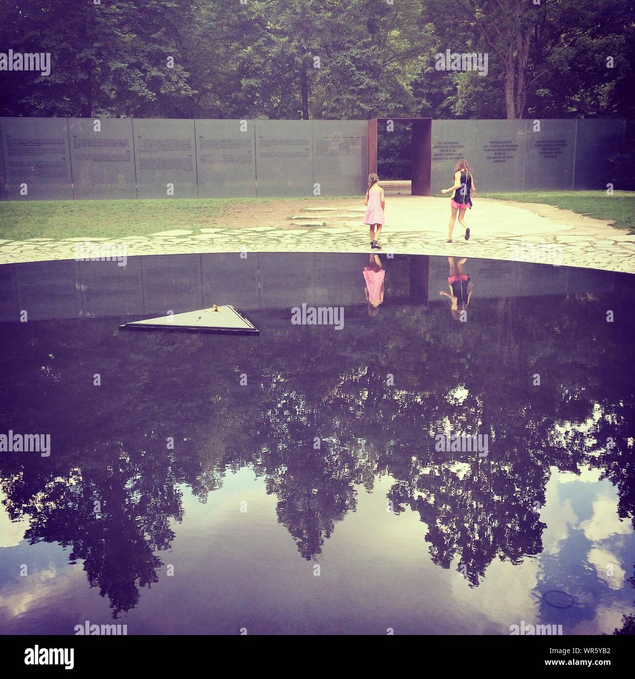Two girls by the pond hi-res stock photography and images - Alamy