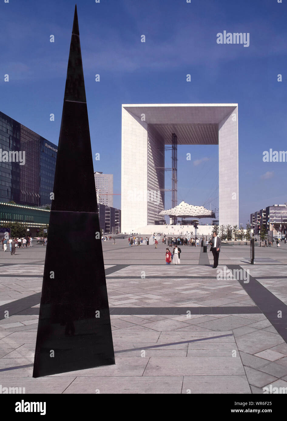 La Defense Grande Arche monument & part French government offices in modern business area with a black pyramid sculpture on the esplanade Paris France Stock Photo