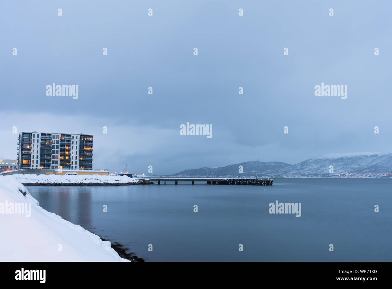 Residential blocks of flats in Tromso suburb in winter, Norway Stock
