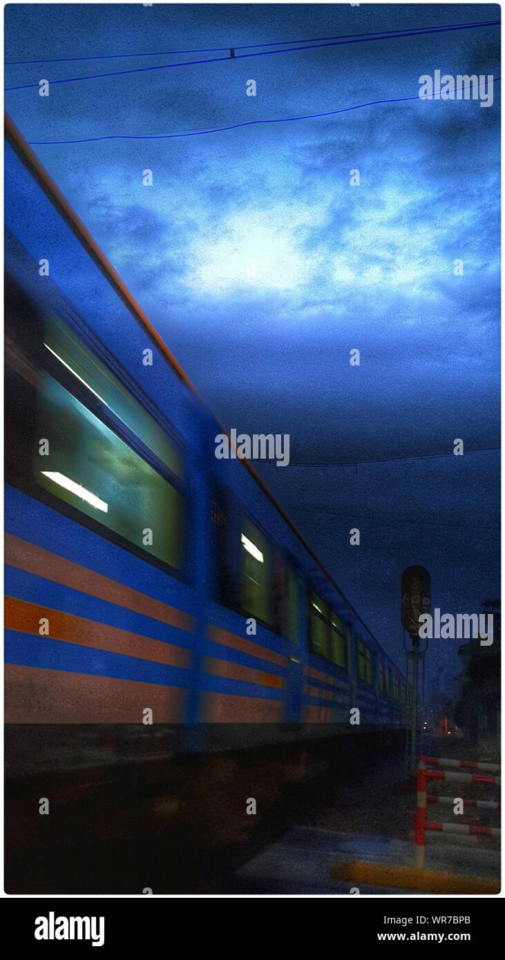 Passenger Train At Night Stock Photo