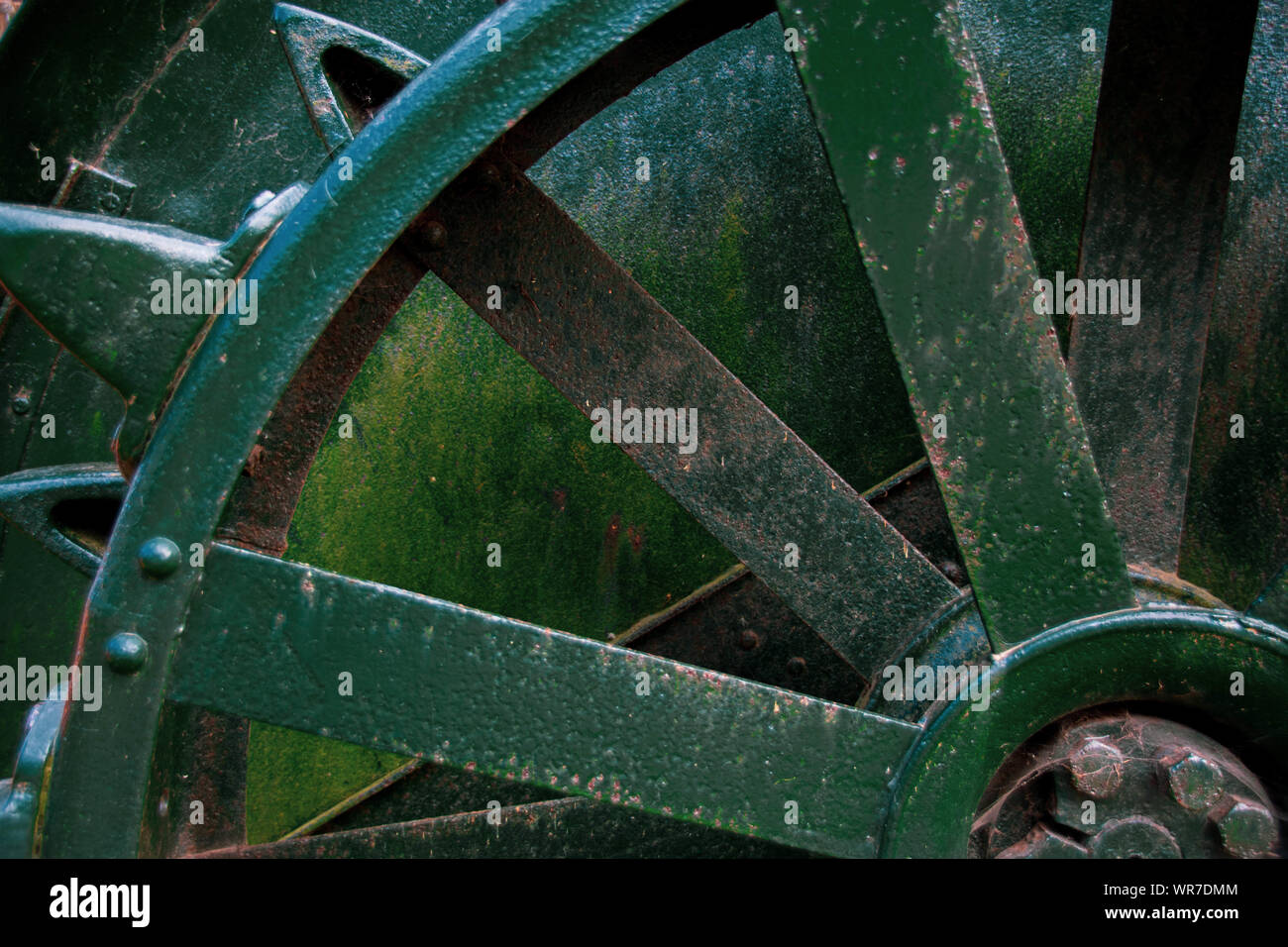 Close up of an old green tractor wheel Stock Photo