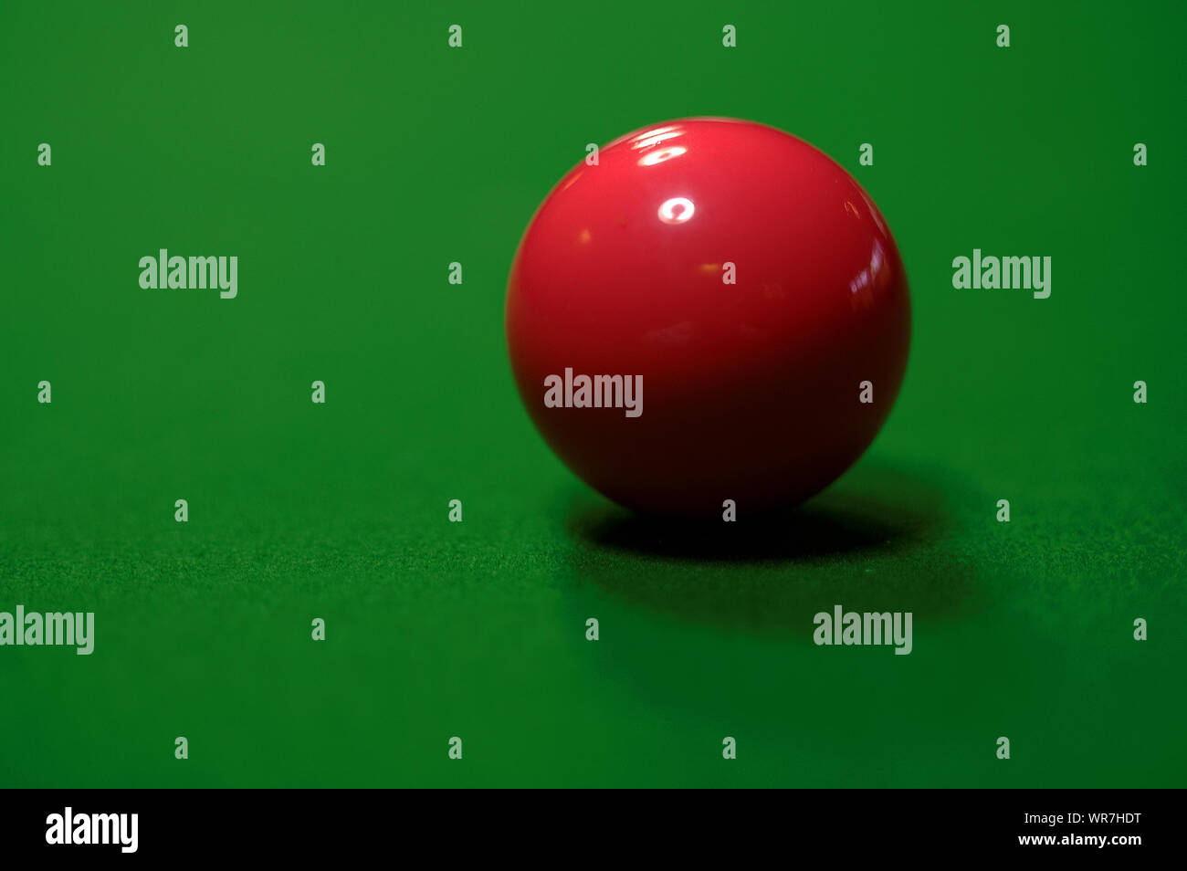Close-up Of Red Snooker Ball On Table Stock Photo