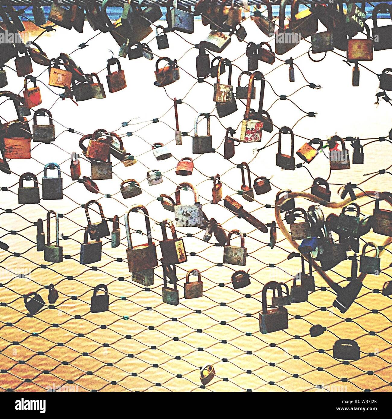 Padlocks Hanging On Chain Link Fence Stock Photo - Alamy