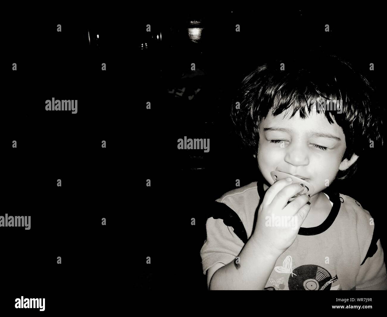 Girl holding pacifier hires stock photography and images Alamy