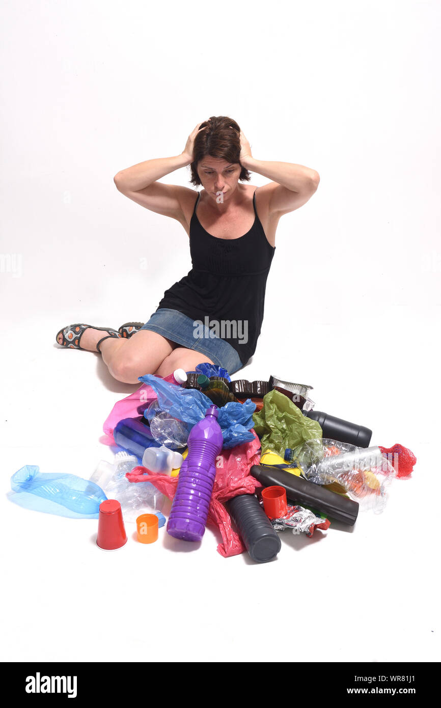 woman worried about plastic dustbin Stock Photo Alamy