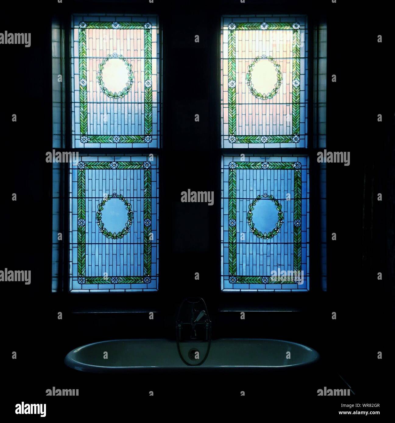 Stained Glass Window Above Bathroom Sink Stock Photo Alamy