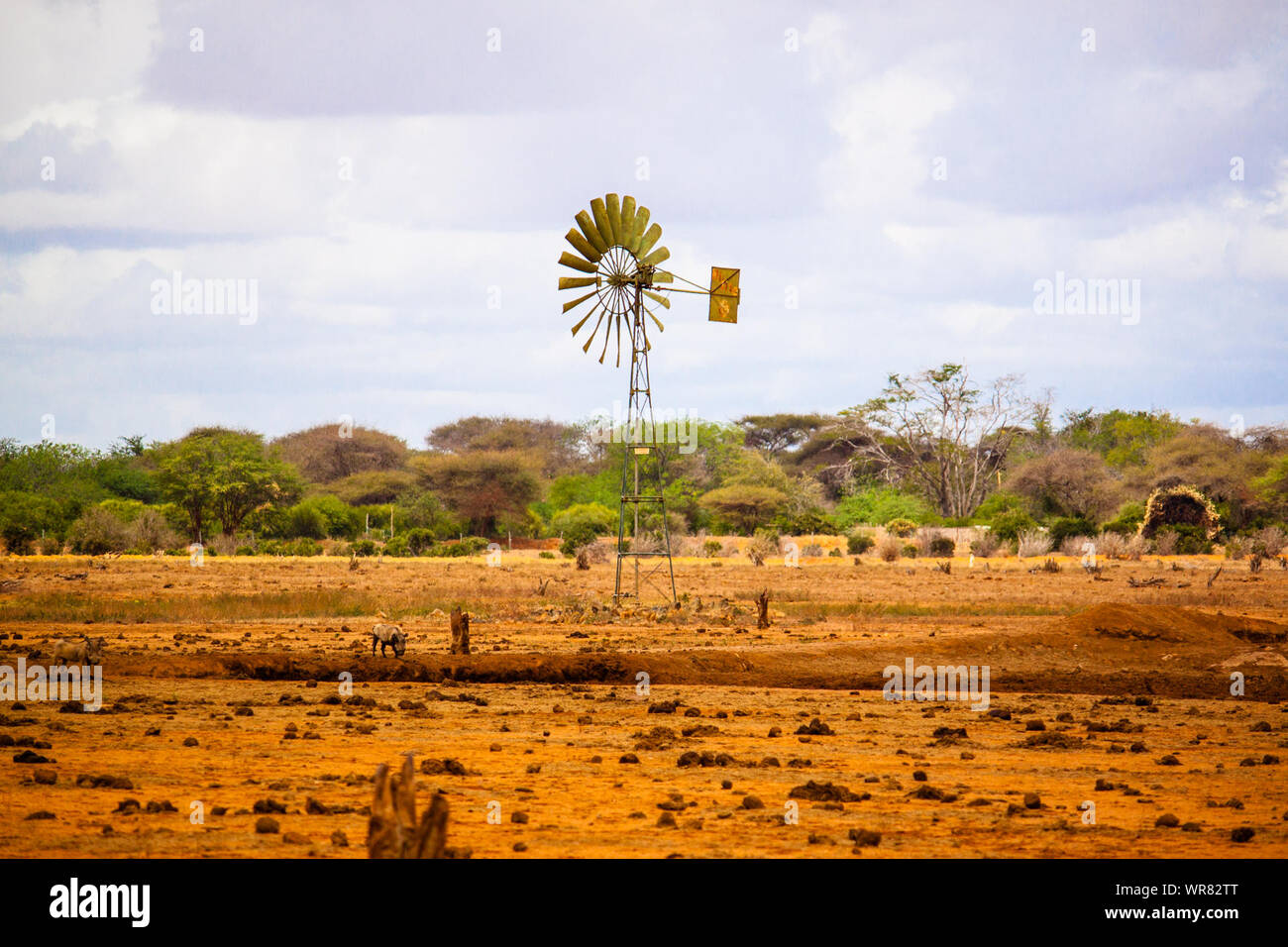 American-style Windmill On Field At Tsavo East National Park Stock Photo