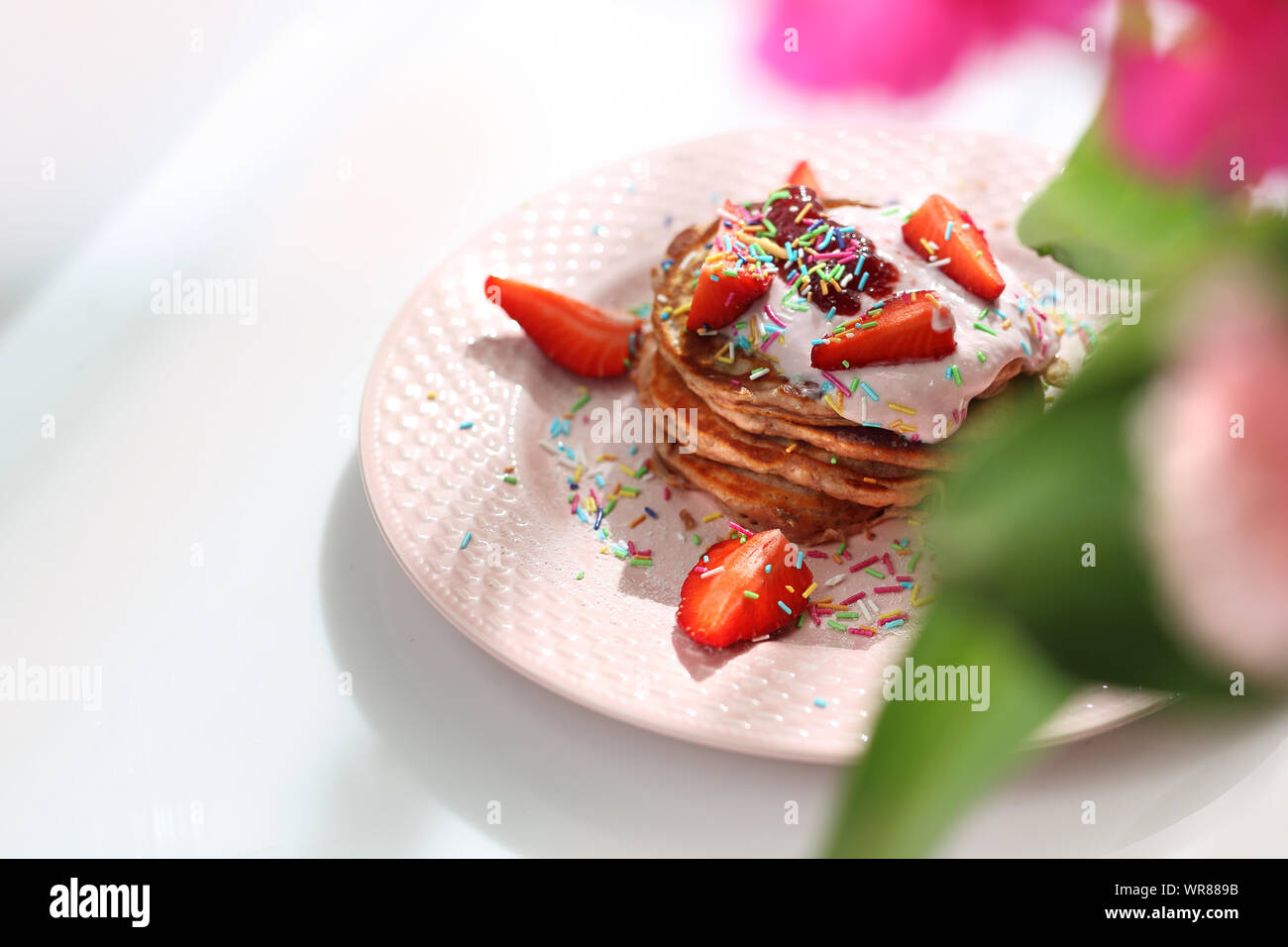 Pink Pancakes With Strawberries Cottage Cheese And Colorful Sugar