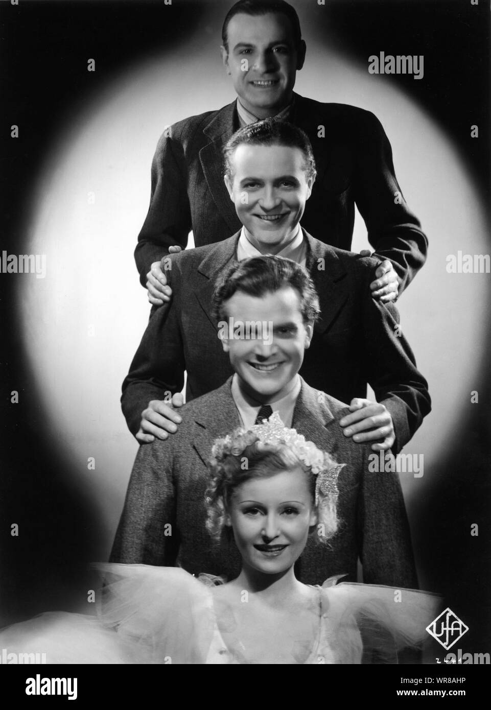 LILIAN HARVEY and her 3 leading men from top JEAN GALLAND (French version) WILLY FRITSCH ( German) and ESMOND KNIGHT (English) in ROSES NOIRES / SCHWARZE ROSEN / BLACK ROSES 1935 director Paul Martin Universum Film ( UFA) Stock Photo