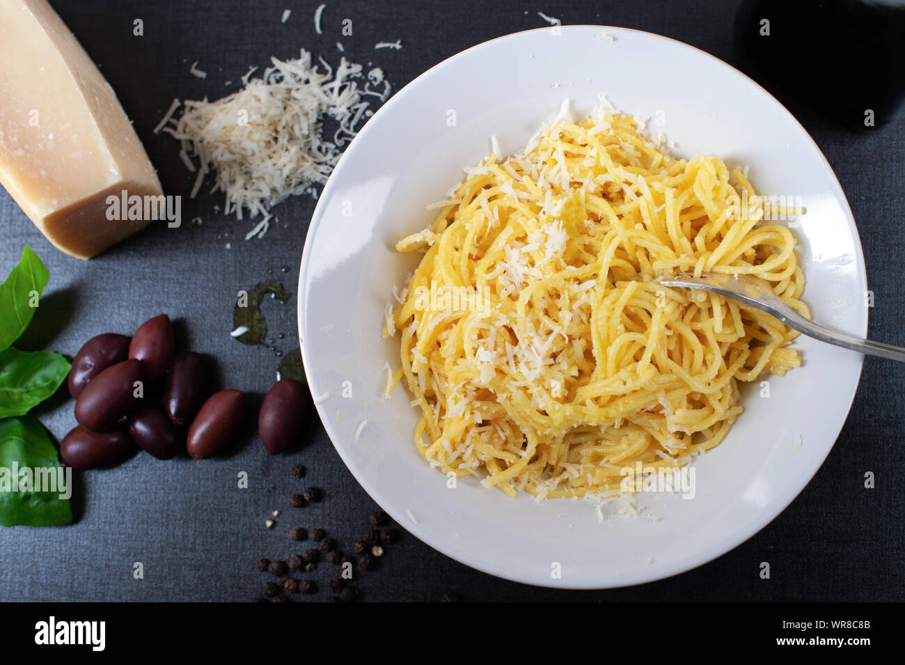 Spaghetti with parmesan cheese and olive oil Stock Photo