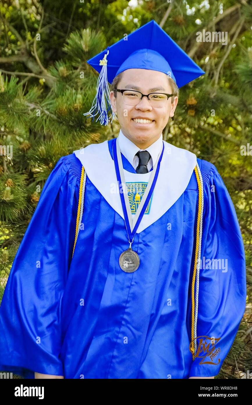 Dark Blue Graduation Cap And Gown