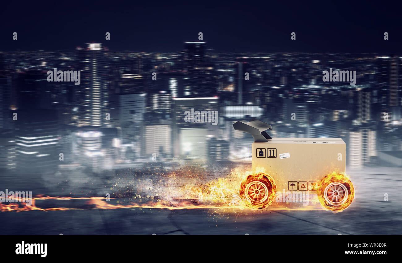 Priority Cardboard box with racing wheels on fire. Fast shipping by ...