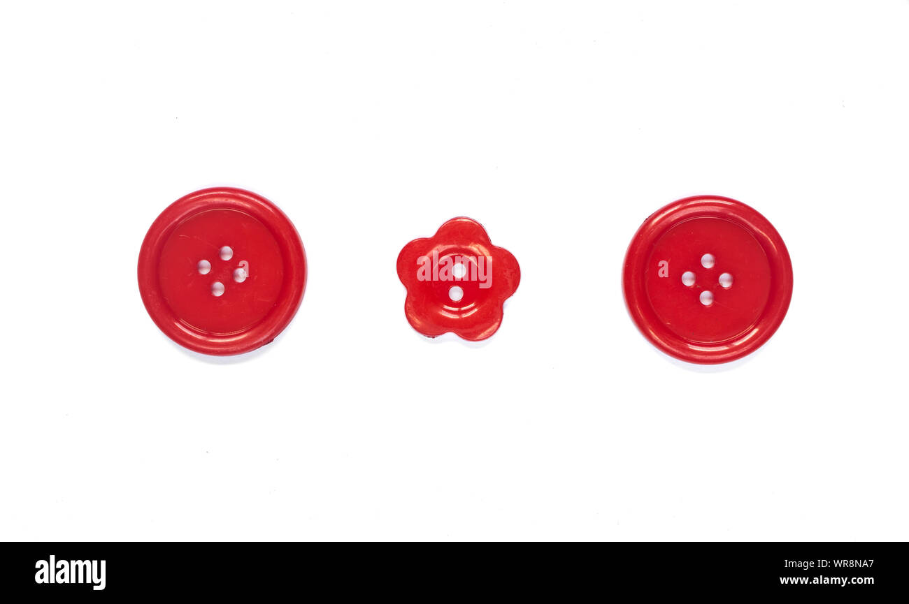 Three Various red sewing buttons isolated on background Stock Photo Alamy