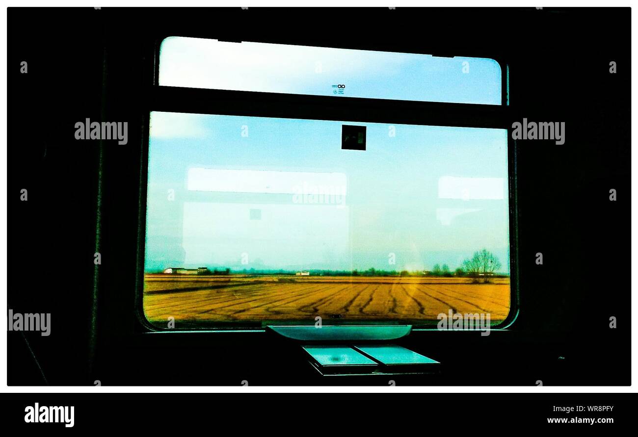 Train Window And Fields Stock Photo