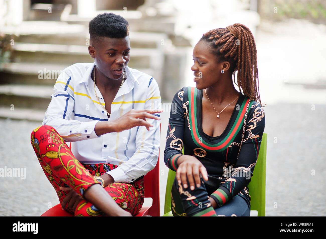 Handsome stylish african american couple posed at street together in ...