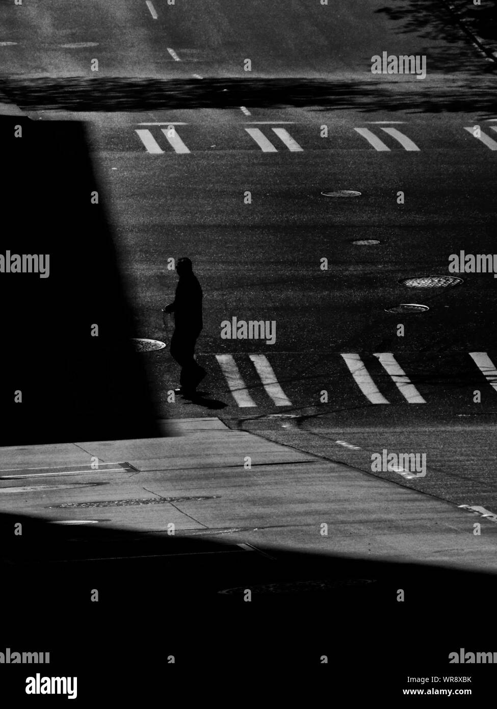Man Walking Side View Sunlight Black and White Stock Photos & Images ...