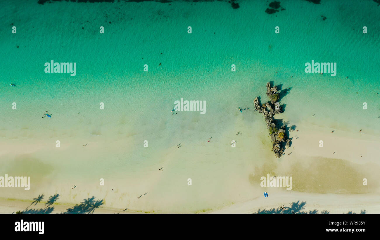 Tropical sandy beach with wave and turquoise water,copy space for text, aerial view. Ocean with waves and tropical beach. Summer and travel vacation concept Stock Photo