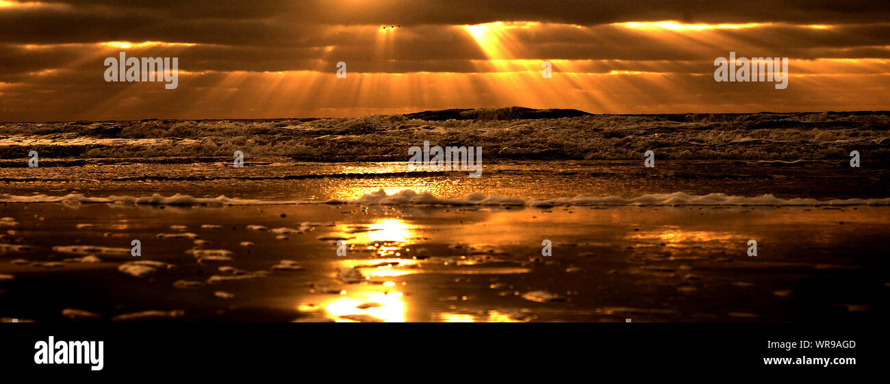 Sunset at the beach of the island Amrum Stock Photo - Alamy