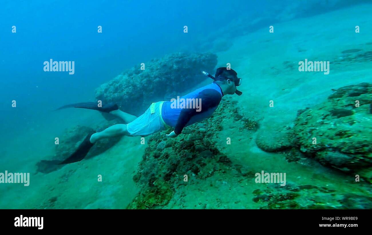 Man snorkeling in ocean hi-res stock photography and images - Alamy