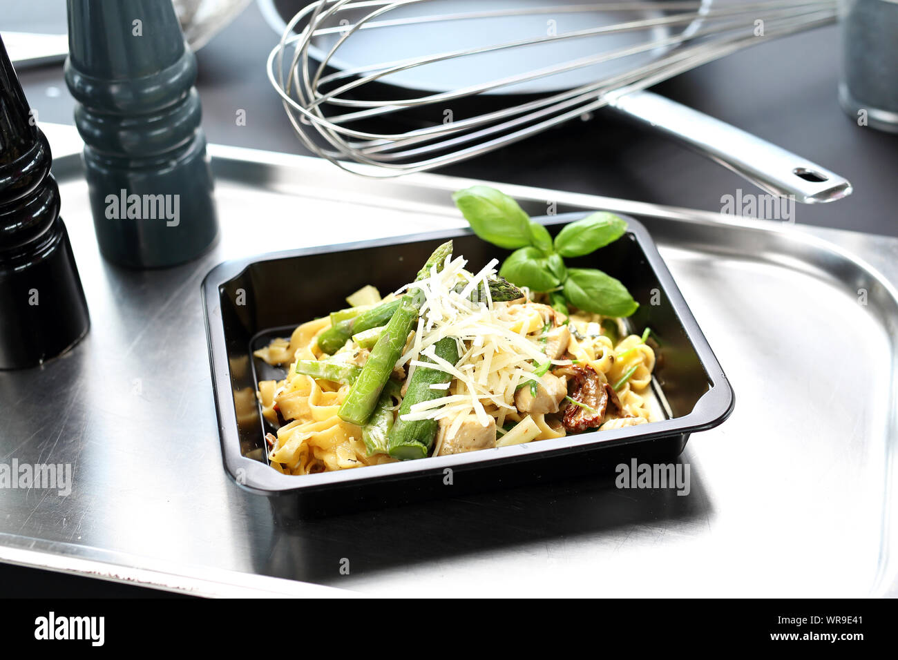 Lunch box. Pasta with asparagus. Takeout dish Stock Photo Alamy
