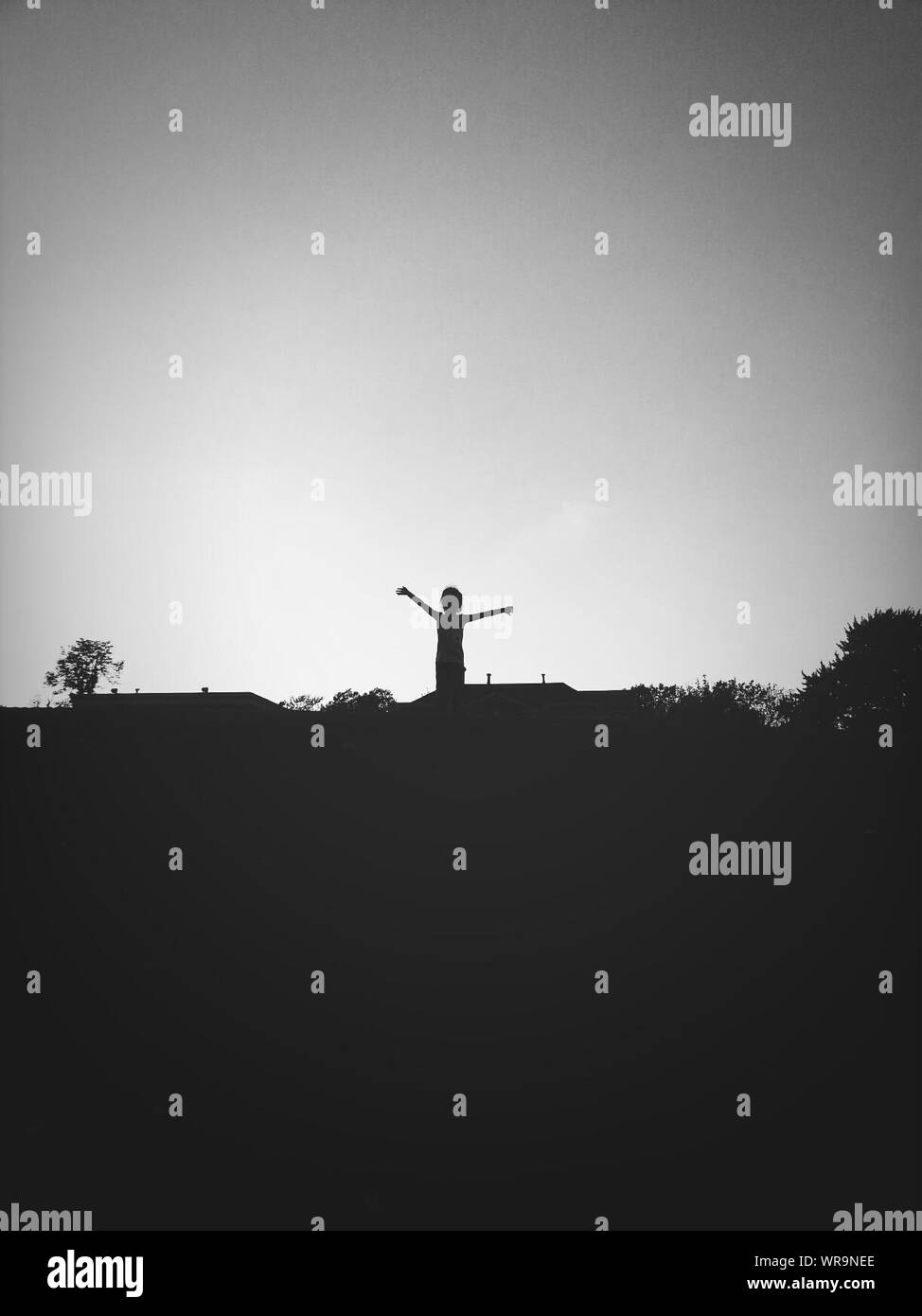 Woman silhouette arms up hi-res stock photography and images - Alamy