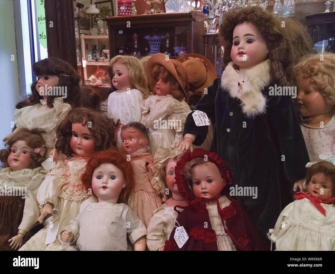 Dolls Displayed In Antique Shop For Sale Stock Photo - Alamy