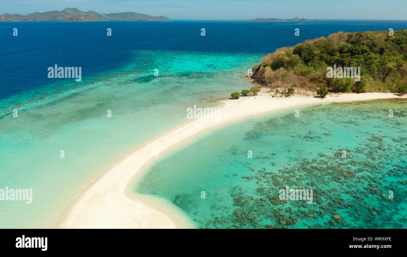 aerial seascape tropical island with sand bar, turquoise water and ...