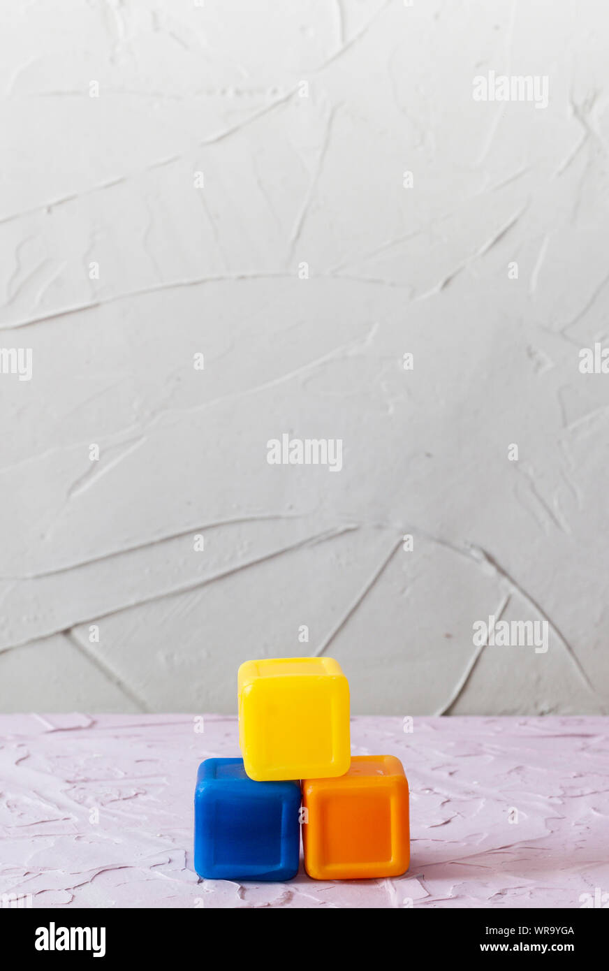 Colorful Cubes. Plastic blocks with copy space Stock Photo - Alamy