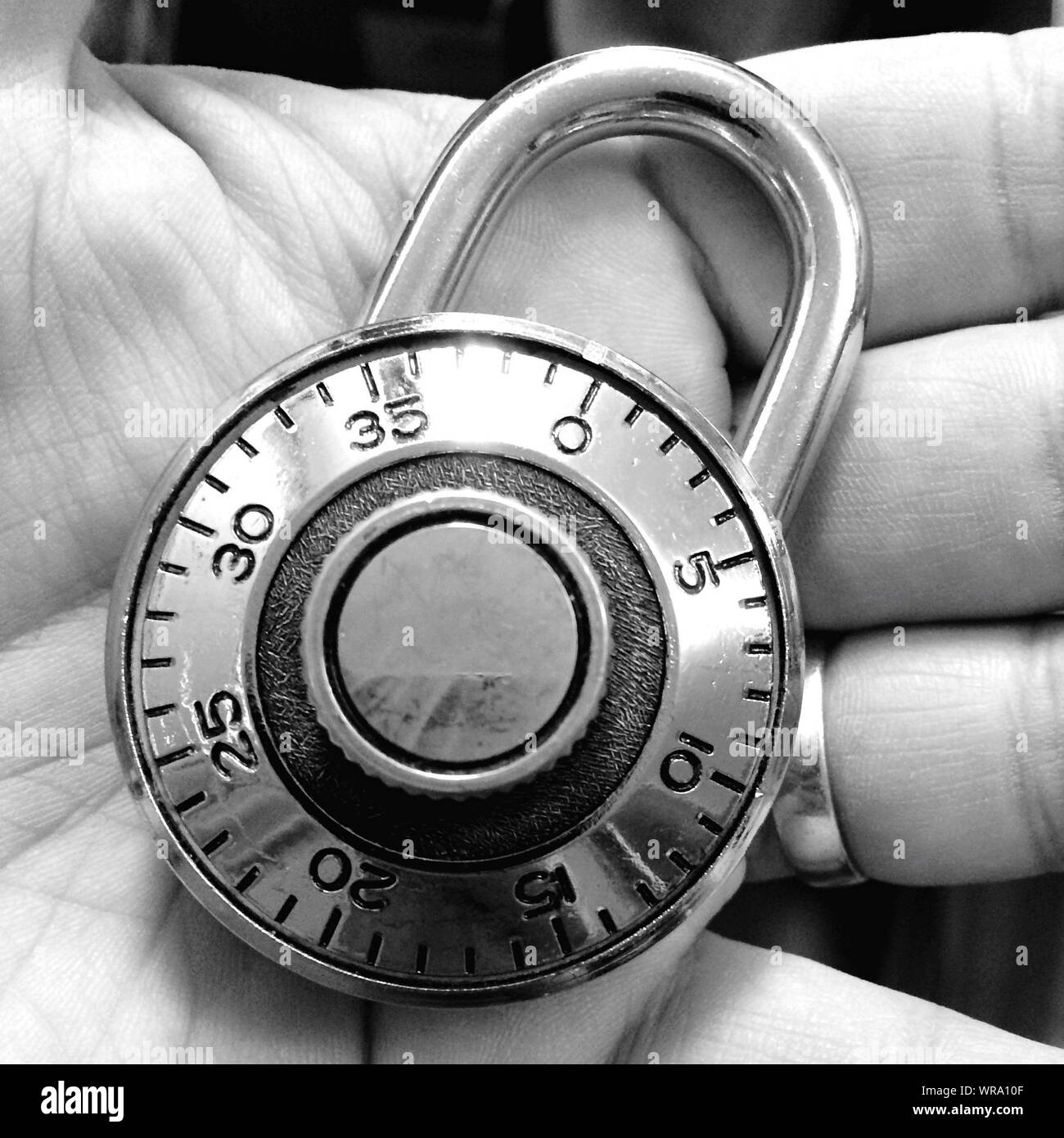 Hand holding lock hires stock photography and images Alamy