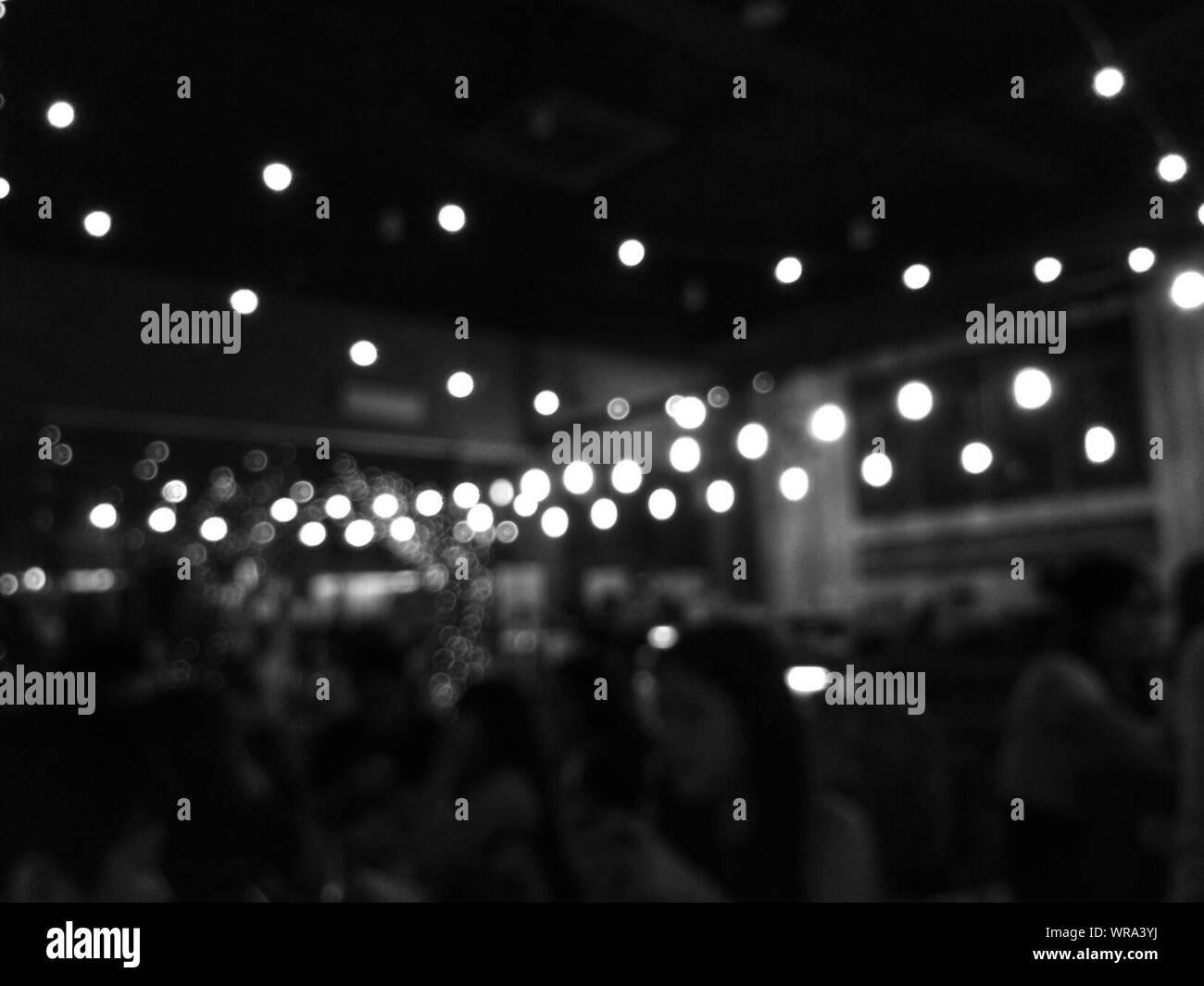 Group Of Blurred People Below Lights Stock Photo Alamy group-of-blurred-people-below-lights-stock-photo-alamy