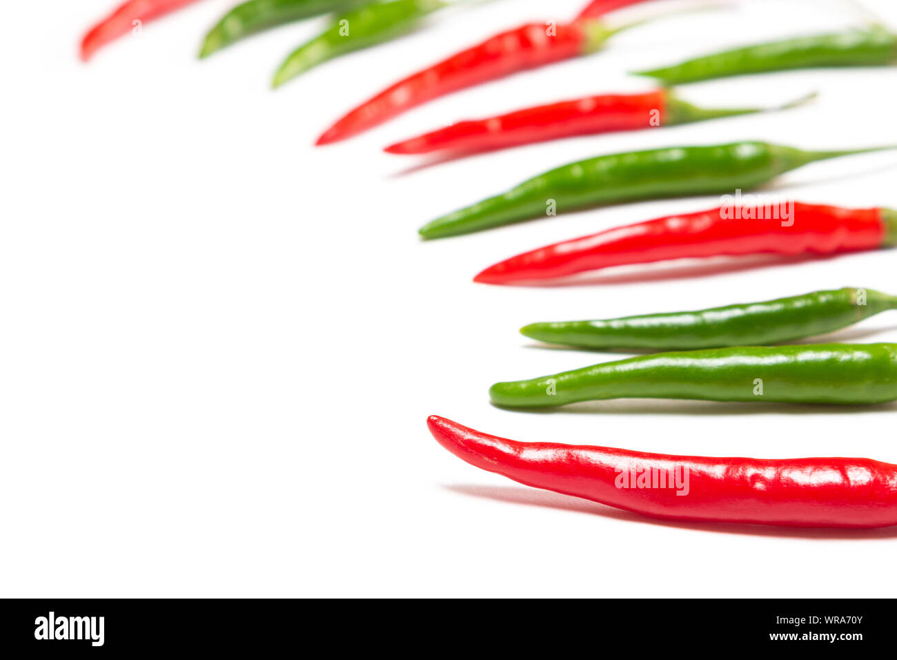 Red and green chili peppers on white background with copy space Stock ...
