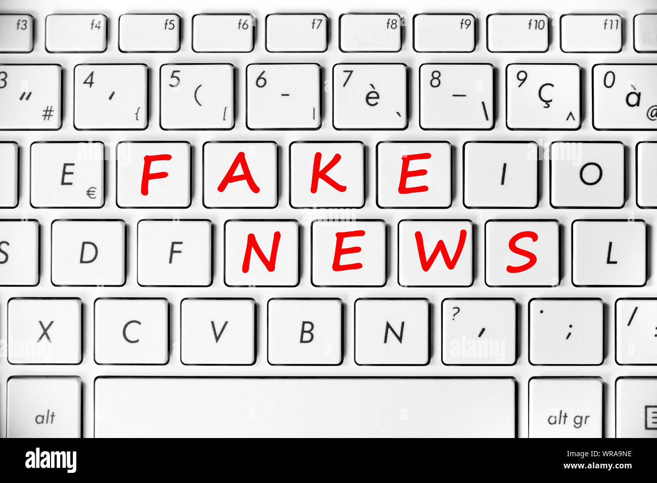 Fake news written on a computer keyboard background Stock Photo