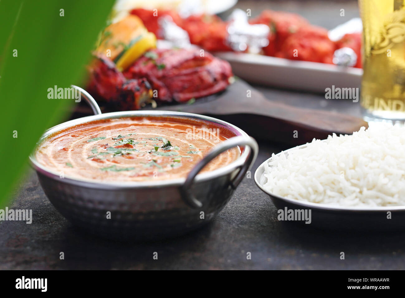 Red curry, aromatic curry with mango and tomatoes. Traditional Asian cuisine. Stock Photo