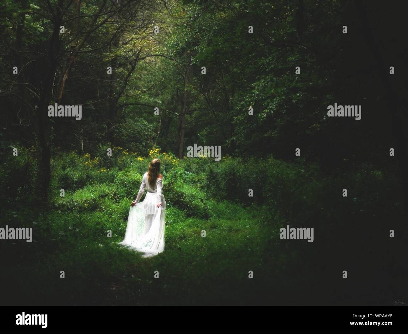 One woman long white dress hi-res stock photography and images - Alamy