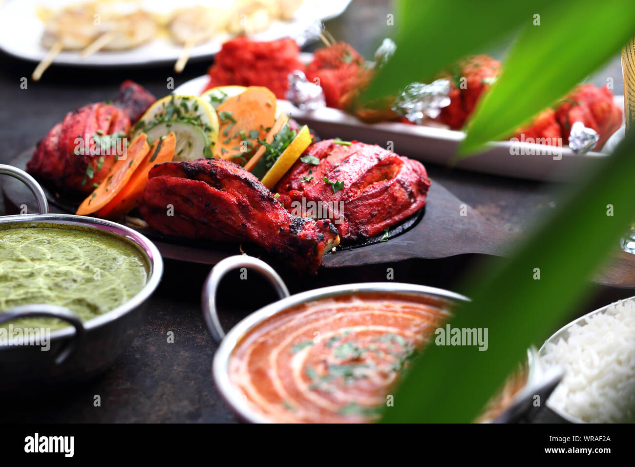 Indian cuisine, aromatic curry dishes. Colorful dishes. Stock Photo
